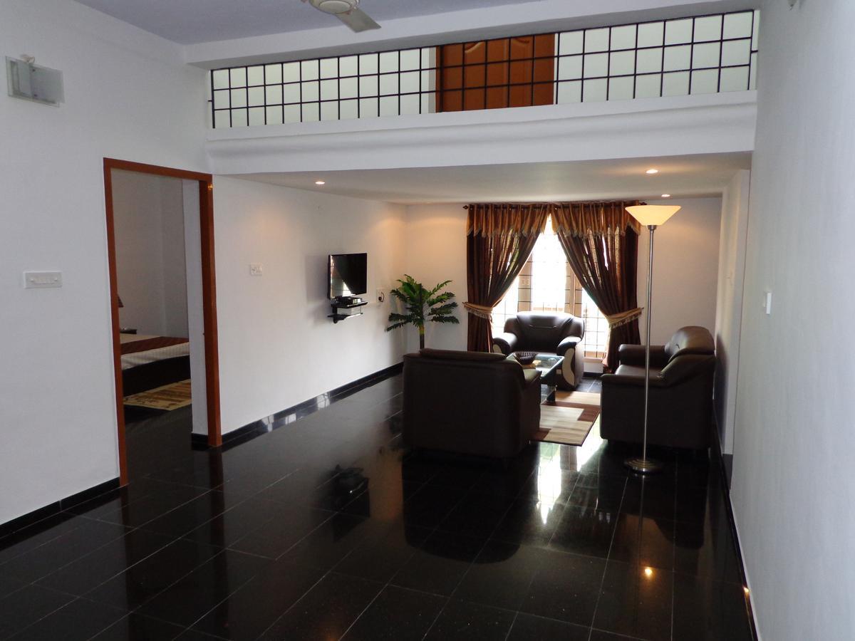 Remisha Service Apartments Chennai Værelse billede